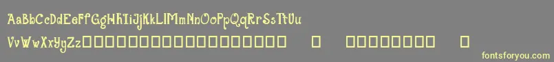 TheGrandStaircase Font – Yellow Fonts on Gray Background