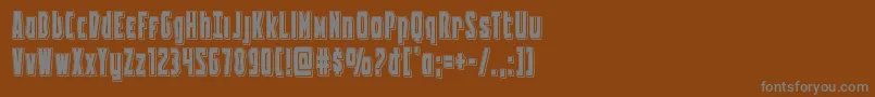 Battleworldpunch-fontti – harmaat kirjasimet ruskealla taustalla