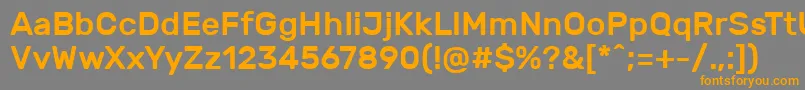RubikMedium-fontti – oranssit fontit harmaalla taustalla