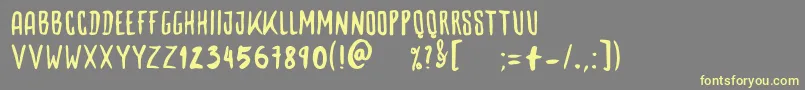 Woodbone Font – Yellow Fonts on Gray Background