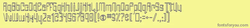 AngieGroovin-fontti – harmaat kirjasimet keltaisella taustalla