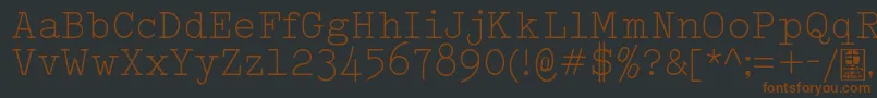 Czcionka TypowriterLightDemo – brązowe czcionki na czarnym tle