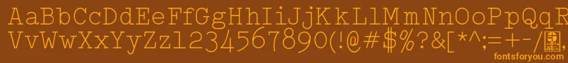 フォントTypowriterLightDemo – オレンジ色の文字が茶色の背景にあります。
