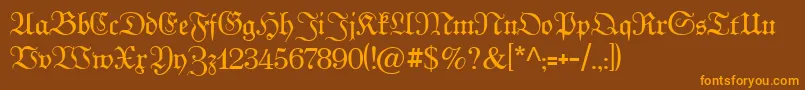 Więcej informacji o czcionce Kabinettfraktur Czcionka Kabinettfraktur – pomarańczowe czcionki na brązowym tle