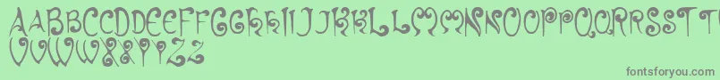 フォントHyacinth – 緑の背景に灰色の文字