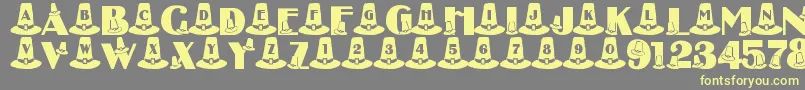 LmsPuritanPartyHats Font – Yellow Fonts on Gray Background