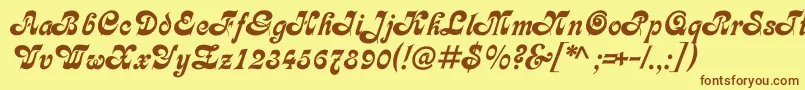 フォントAsessorc – 茶色の文字が黄色の背景にあります。