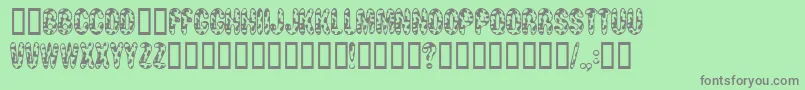 Moocowsw Font – Gray Fonts on Green Background