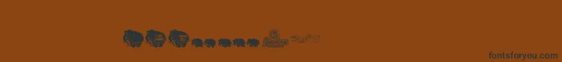 Pinkcandypopcornbats Font – Black Fonts on Brown Background