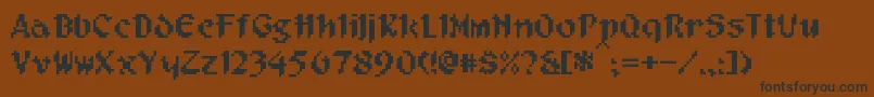 Czcionka PixelMusketeer – czarne czcionki na brązowym tle
