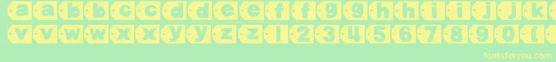 DjbTaggedAgain2-fontti – keltaiset fontit vihreällä taustalla