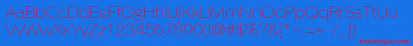 PhinsterfineRegular-Schriftart – Rote Schriften auf blauem Hintergrund