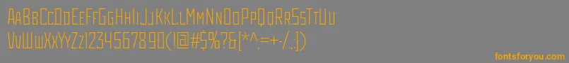 Шрифт Rodchenkocondlightc – оранжевые шрифты на сером фоне