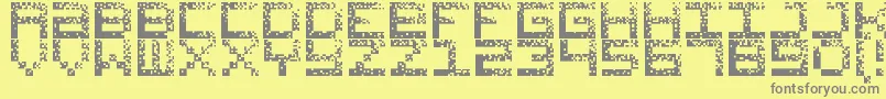 フォントHackedCrt – 黄色の背景に灰色の文字