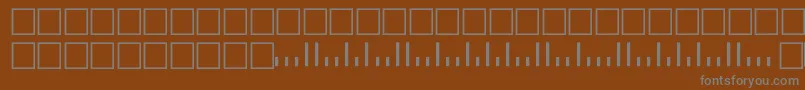 フォントV500001 – 茶色の背景に灰色の文字