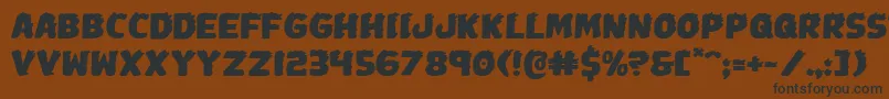 Johnnytorchexpand Font – Black Fonts on Brown Background