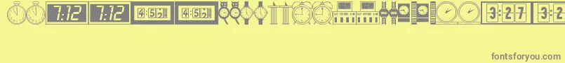Czcionka Timepcs – szare czcionki na żółtym tle