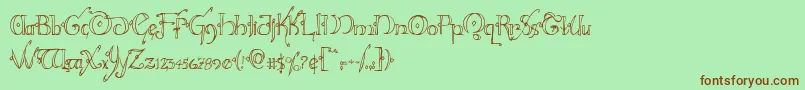 Шрифт Hollyjinglecond – коричневые шрифты на зелёном фоне