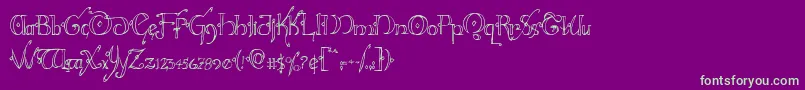 フォントHollyjinglecond – 紫の背景に緑のフォント