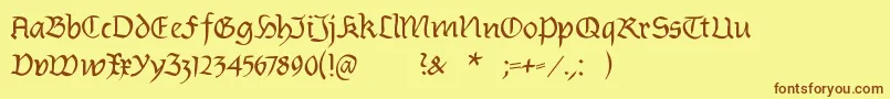 フォントBurtinomatic – 茶色の文字が黄色の背景にあります。