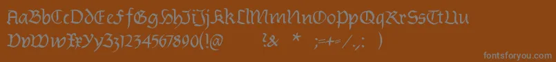 フォントBurtinomatic – 茶色の背景に灰色の文字