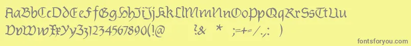 Burtinomatic-Schriftart – Graue Schriften auf gelbem Hintergrund