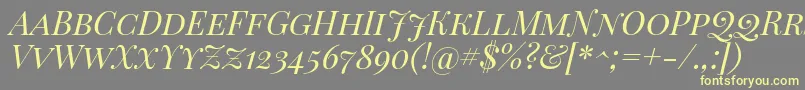 PlayfairDisplayScItalic-fontti – keltaiset fontit harmaalla taustalla