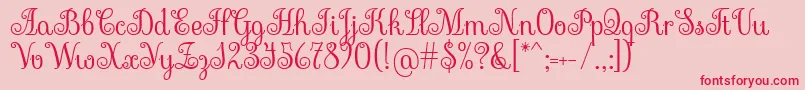 SevillanaRegular Font – Red Fonts on Pink Background