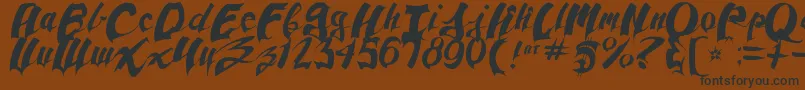 Шрифт AnpadScript – чёрные шрифты на коричневом фоне