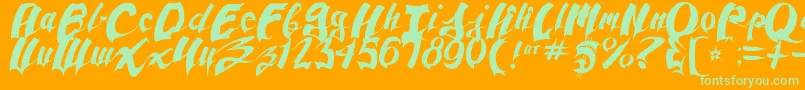 Czcionka AnpadScript – zielone czcionki na pomarańczowym tle