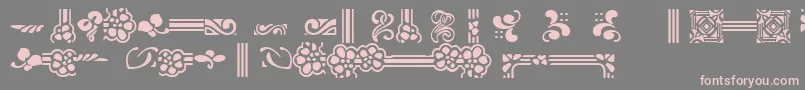 フォントAuriolFlowers1 – 灰色の背景にピンクのフォント