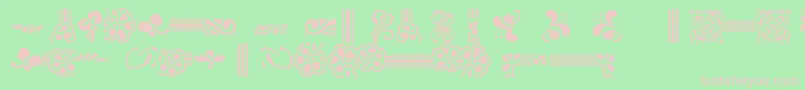 フォントAuriolFlowers1 – 緑の背景にピンクのフォント