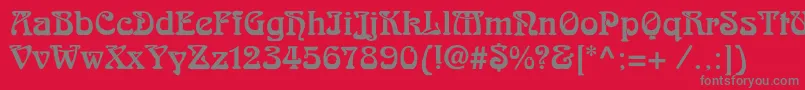 フォントSkazkac – 赤い背景に灰色の文字