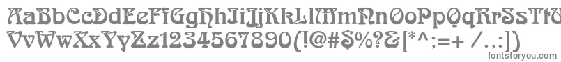 フォントSkazkac – 白い背景に灰色の文字