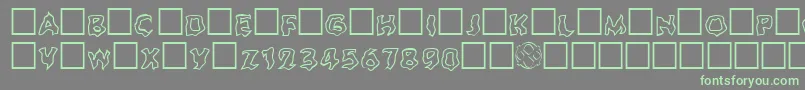 Ghouloutline Font – Green Fonts on Gray Background