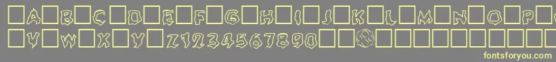 Ghouloutline Font – Yellow Fonts on Gray Background