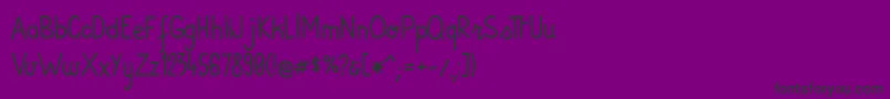 AndiRegular-fontti – mustat fontit violetilla taustalla