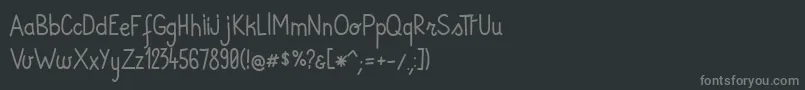 Fonte AndiRegular – fontes cinzas em um fundo preto