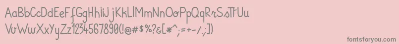 Fonte AndiRegular – fontes cinzas em um fundo rosa