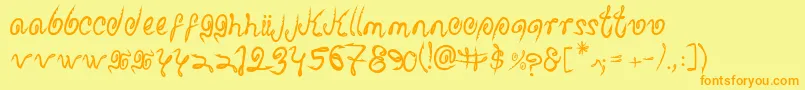 フォントSharkattack – オレンジの文字が黄色の背景にあります。