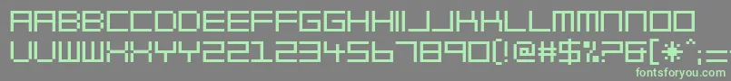 BlockOut-Schriftart – Grüne Schriften auf grauem Hintergrund