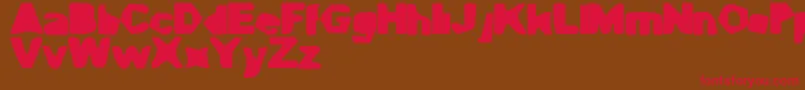 CaveGyrl Font – Red Fonts on Brown Background