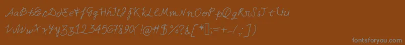 フォントMiahand – 茶色の背景に灰色の文字