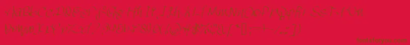 フォントGhettomagnetic – 赤い背景に茶色の文字