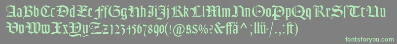 GoudyTextMtDfr-Schriftart – Grüne Schriften auf grauem Hintergrund