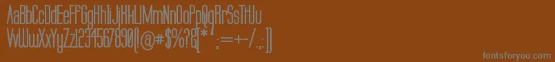 Labtopb-Schriftart – Graue Schriften auf braunem Hintergrund