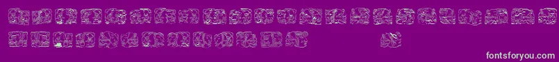 SpiritOfMontezumaFive Font – Green Fonts on Purple Background