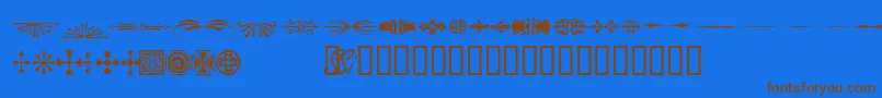 フォントWoodcutornamentsonessk – 茶色の文字が青い背景にあります。