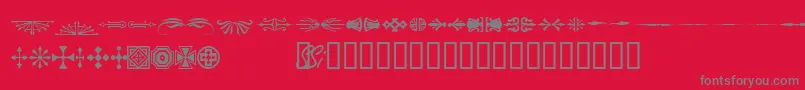 Woodcutornamentsonessk Font – Gray Fonts on Red Background