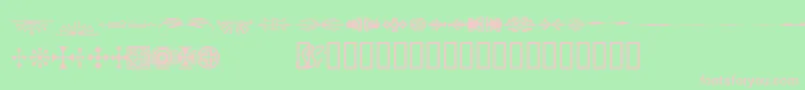 Woodcutornamentsonessk-fontti – vaaleanpunaiset fontit vihreällä taustalla